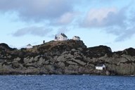 <p><br />
View from the fjord towards the Geita lighthouse on the eastermost island of Geita.</p>