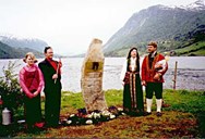 17 May, 2001, the unveiling ceremony. From left: Therese S. Holsen (unveiled the stone), Tor Arild Nydal Holsen (donated the stone from his property), Berit Hårklau (wrote the text on the brass plaque), and Atle Holsen (project leader).