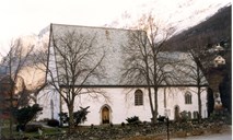 Vangen church in Aurland in the 1980s. The cornerstone was laid on 2 May 1202, and it took 80 years to build the "Sogn Cathedral" as it is also called. The local historian Anders Ohnstad thinks that king Sverre's mother came from Aurland. Her name was Gunnhild Sultan, meaning Gunnhild at or from Sult. The Onstad farm was then called Sult. Sverre, who had studied theology, may have contributed to getting the church built. Sverre died close to two months before the cornerstone was laid.