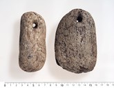 Loom weights from Yter Moa. The stones were used to tighten the warp on the upright loom. (Photo: The County Archives of Sogn og Fjordane)
