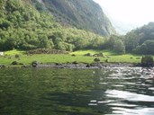 The big burial mound at the "spring farm" of Holmo may be interpreted as a material expression of power. Besides, it may also reveal something about the Bronze Age people who controlled this part of the fjord.