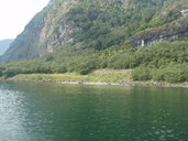 Fronnes seen from the fjord. The river and the waterfalls are best seen from land. 
