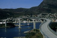 The roadwork on the mainland started in October 1970. The bridge contract started in November 1971, and the main contractor was Eeg Henriksen A/S. In January 1972, the concreting work started, and in December 1973, the bridge was completed and opened for traffic. 