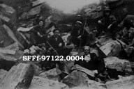 In this picture we see a group of workers at the rock pile after the first dynamite burst of the Almenning tunnel. Martin Åsebø (no. 2) was a certified blaster and married Alvhild Solberg Åsebø, who was a cook at the construction site. They married in 1947. The men in the picture are: Norvald Hatlenes, Martin Åsebø, Karl Sæterbakke, Andreas Åsebø and Håkon Engeland. 