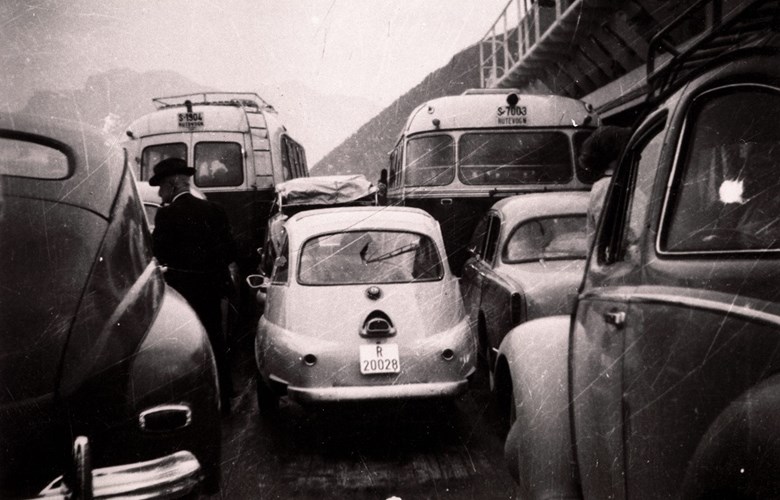 Bumper to bumper on the ferry between Instefjord and Vadheim some time in the late 1950s. The ferry connection was established in the summer of 1955 with the ferry M/F "Vetlefjord". The ferry crossing took one hour. In July 1955, the ferry carried 64 cars, 32 bicycles, five motorcycles and 853 passengers. This was less than projected, but people thought that the traffic would pick up when the road Lavik-Vadheim was completed. There was some uncertainty whether the ferry service would be continued in 1956, but Brekke and Lavik decided to cover any deficit. 