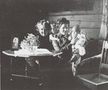 Alhed Schou, her daughter Gina Borchgrevink, and two grandchildren. H. M. Schou, doctor, became the owner of Kirkevollen in 1876.
