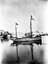The first sealer Hess and Strømmen bought was the sailing-ship "Polarstrømmen", here at anchor in Buskøyvågen. The 72-foot boat was bought in 1910. With this boat, the crew could sail to the Arctic Sea and back and was able to manoeuvre among the icebergs. Lucky Lyder Strømmen was able to take this vessel to the top among their boats every year. In 1916, a 30HP Wichman engine was installed.