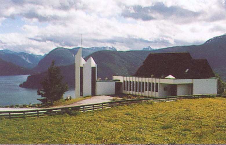 The modern local church community centre has a commanding view of the fjord.
