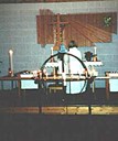 When the church was new, there was only a steel cross on the wall above the altar. For the 10th anniversary of the church in 1983, an altarpiece was installed, designed by the artist Ingjerd Pettersen Hagh and made by Jarle Myklebust. The cross is now placed in the mortuary room. Wood is the main material used in the altarpiece, but glass mosaic is also used. The expression is rich in symbols, with the use of the triangle, the classic symbol of 'The Holy Trinity', and the way to heaven, to God. 