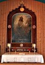 The altarpiece is made by Per Vigeland, Gustav Vigeland's nephew. The motif is 'Jesus' resurrection'.