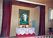 The altarpiece is painted by Vilhelm Bjørknes, with the motif  'Jesus saves the sinking Peter'. This is a highly suitable motif for a coastal and fishing community such as Værlandet. On the altar there are two candlesticks in silver-plated iron.