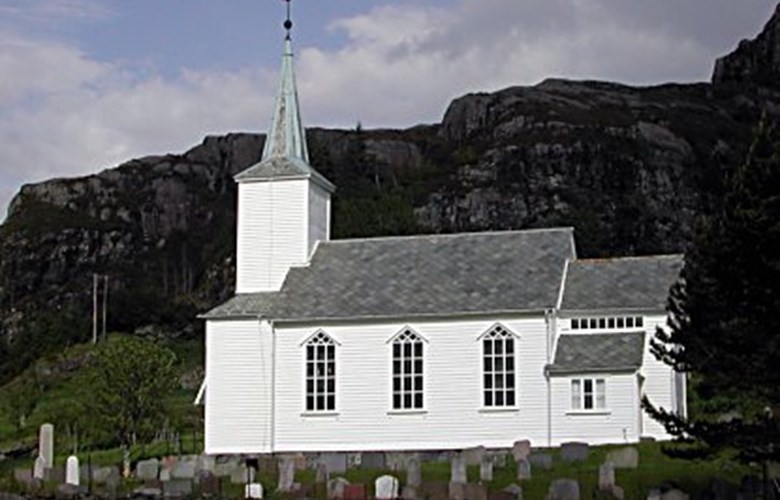 Hersvik church built in 1891, in the same year as the Hersvik 'sokn' was established. The church has a sheltered location on a field. It has a north-south orientation in the terrain, with the chancel and altar facing south.