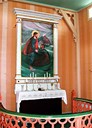 The altarpiece from 1920 is painted by Mons Breidvik (1881-1950) from Brekke in Gulen. The following year he made a copy for the Norwegian Seamen's Church in New Orleans. In 1923, he decorated the chancel walls in Laksevåg church. Breidvik also painted the altarpiece - a copy of Rubens - in Nordreisa church in the county of  Troms. In the period between 1925 and1936, he worked in the USA, where he carried out a major decoration assignment of the Grace Episcopal Church in New York, with Christ's Resurrection as the main motif.