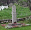 The memorial stone on the Hersvik churchyard is located in the yard in front of the main entrance of the church.