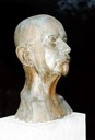 G. F. Heiberg 1872-1944. The bust is made by the artist Nicolai Schiøll in 1942. The owner is the Heiberg Family Museum. Heiberg was chairman of 'Historielaget for Sogn' from its foundation in 1909 until he died. He was also editor of the History Association's magazine and he also contributed with a number of articles.