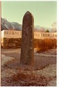 The Oscar II stone at Hotel Mundal in 2000. The stone was raised before the hotel was built and stood along the village road. When the road was moved a few metres closer to the fjord, the stone was left standing in the hotel garden.