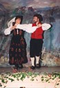 Competition at Sandane in 1993, Leikny Aasen and Vidar Underseth performing the Solund "springar". Vidar is also a "halling" dancer which is actually the title he uses in the telephone directory! He dances the "halling" in class A both with a partner and solo. He has won the national competition three times with Hilde Bjørkum, in 1989 they received the King's Cup. Twice he has won second place in solo "halling" dancing at the national competition.