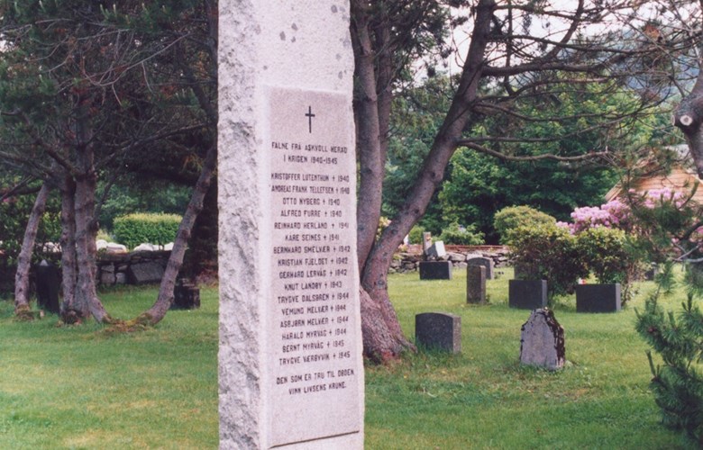 The memorial stone for fallen soldiers in the war 1940-1945 at the Askvoll church, unveiled on 17 May 1956. This was ten years after the first initiative to erect a memorial had been taken. In 1947, the newspaper Firda reported that it had been decided to erect the stone in the garden in front of the municipal administration building, and that rock from Askvoll would be used. But time passed, and there was no memorial. In 1955, a notice signed S. Klokkernes drew the attention of people to the memorial stone, pointing at the municipality and the mayor. ".. this is a point of honour for the municipality, and this cause must not be shelved!"