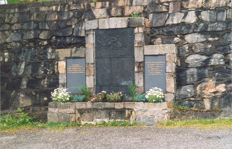 The fishermen's memorial at the Måløy church, raised in September 1957, is built into the stone wall towards the churchyard above the church. Originally, there was one memorial plaque, but later on two more have been added with names of lost seamen after 1957. 
