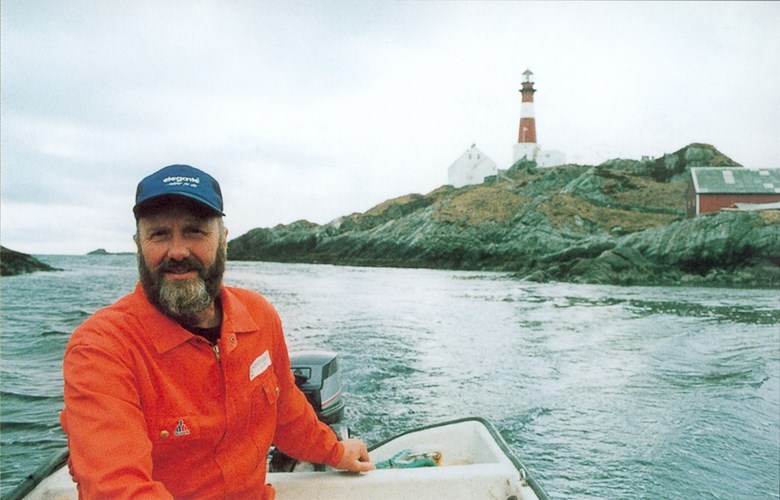 The Ytterøyane lighthouse is located in a nature reserve, and this picture shows the lighthouse keeper Trygve Strømmen on an inspection tour around the islands in a small boat on a sunny day. Ytterøyane is one of about 30 lighthouse stations that are still manned in this country.