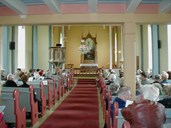 In 2001, the centenary / centennial of the church was celebrated. The present colours of the interior were painted for the 50th anniversary in 1951. The pulpit is placed to the left of the altar, which is rather unusual.