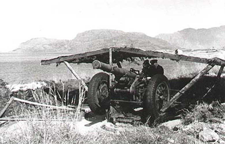 The picture is taken just after the war, showing one of the four French 105mm guns located at Risenes. The same type of gun was also used at the coastal fort at Lammetun.<br />