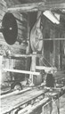 From the interior of the sawmill. Power from the turbines to the machines was transmitted by means of axles and driving belts.