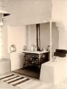 This is what the wood-stove corner of the kitchen in the main building at Vågsberget looked like around 1930.  