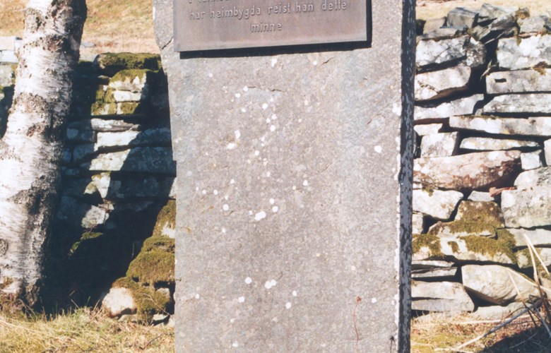 The memorial stone for Rasmus Nyvoll who fell on the battlefield in Italy, stands on the churchyard at Ålfoten church. Fresh flowers are laid on the stone every 17 May.
