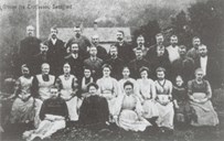"Party at Trolfossen, Søndfjord" is the text in the upper left corner of the picture. The 30 persons - 17 men and 13 women - were employees at the woollen mill.